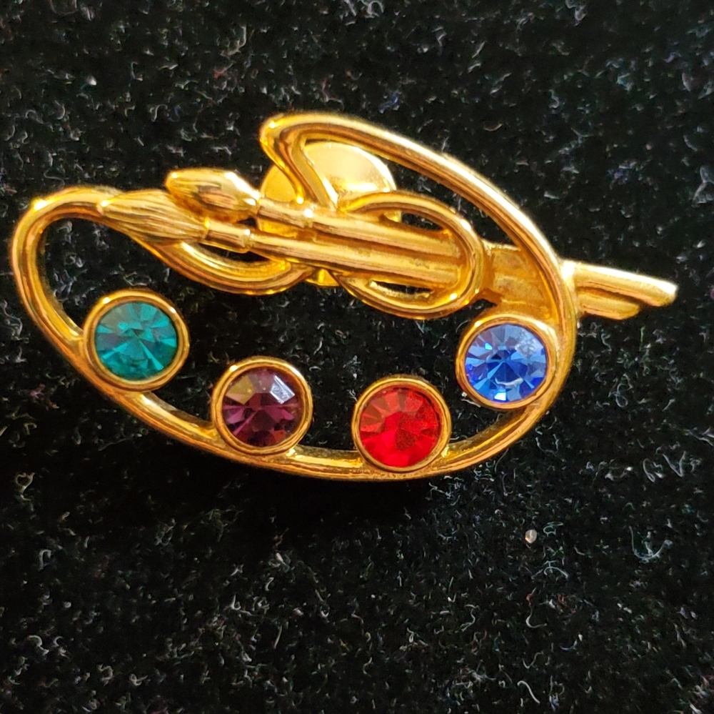 Avon goldtone artist's palette brooch colored rhinestones 1 3/4 inches wide